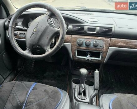 Сірий Крайслер Себрінг, об'ємом двигуна 2 л та пробігом 200 тис. км за 2500 $, фото 14 на Automoto.ua