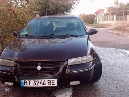 Красный Крайслер Статус, объемом двигателя 2 л и пробегом 330 тыс. км за 2100 $, фото 1 на Automoto.ua