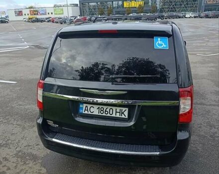 Черный Крайслер Таун Кантри, объемом двигателя 3.6 л и пробегом 300 тыс. км за 11000 $, фото 11 на Automoto.ua