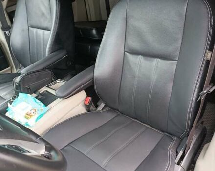 Черный Крайслер Таун Кантри, объемом двигателя 3.6 л и пробегом 300 тыс. км за 11000 $, фото 16 на Automoto.ua