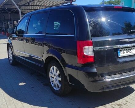 Крайслер Town & Country 2014 у Каменце-Подольском на Automoto.ua Чорний Крайслер Town & Country, об'ємом двигуна 3.6 л та пробігом 223 тис. км за 10800 $, фото 3 на Automoto.ua
