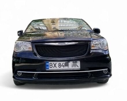 Крайслер Town & Country 2014 у Каменце-Подольском на Automoto.ua Чорний Крайслер Town & Country, об'ємом двигуна 3.6 л та пробігом 243 тис. км за 10200 $, фото 1 на Automoto.ua