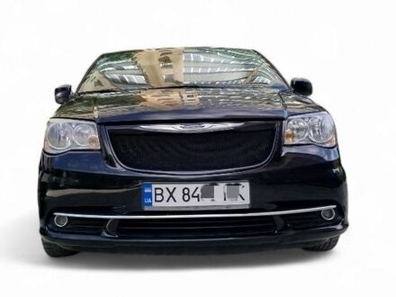 Крайслер Town & Country 2014 у Каменце-Подольском на Automoto.ua Чорний Крайслер Town & Country, об'ємом двигуна 3.6 л та пробігом 235 тис. км за 11000 $, фото 1 на Automoto.ua