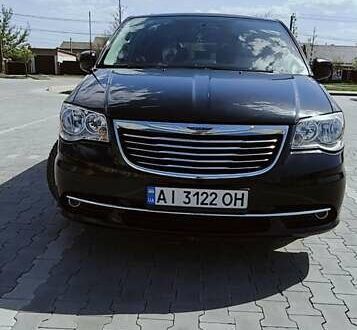 Крайслер Town & Country 2016 у Буче на Automoto.ua Чорний Крайслер Town & Country, об'ємом двигуна 3.6 л та пробігом 195 тис. км за 14400 $, фото 1 на Automoto.ua