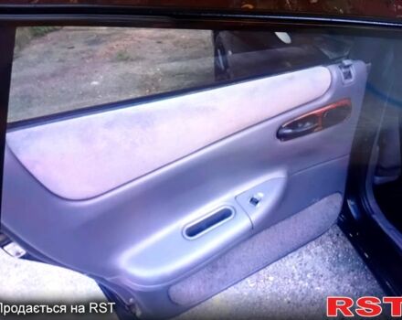 Черный Крайслер Вижн, объемом двигателя 3.5 л и пробегом 208 тыс. км за 2900 $, фото 2 на Automoto.ua