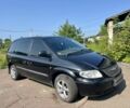 Черный Крайслер Вояджер, объемом двигателя 2.5 л и пробегом 400 тыс. км за 4550 $, фото 1 на Automoto.ua
