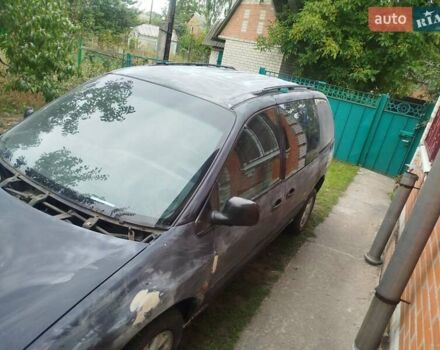 Чорний Крайслер Voyager, об'ємом двигуна 3.3 л та пробігом 335 тис. км за 2500 $, фото 1 на Automoto.ua