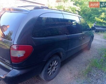 Черный Крайслер Вояджер, объемом двигателя 2.5 л и пробегом 390 тыс. км за 2800 $, фото 2 на Automoto.ua