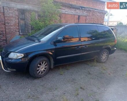 Черный Крайслер Вояджер, объемом двигателя 2.5 л и пробегом 390 тыс. км за 2800 $, фото 3 на Automoto.ua