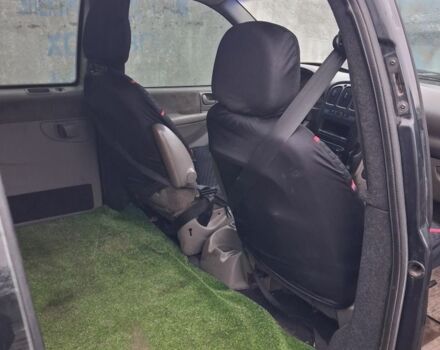 Черный Крайслер Вояджер, объемом двигателя 2.5 л и пробегом 1 тыс. км за 1538 $, фото 4 на Automoto.ua