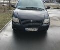 Черный Крайслер Вояджер, объемом двигателя 2.5 л и пробегом 270 тыс. км за 6100 $, фото 1 на Automoto.ua