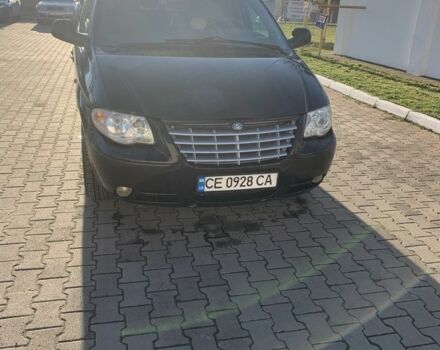 Черный Крайслер Вояджер, объемом двигателя 2.5 л и пробегом 340 тыс. км за 2999 $, фото 1 на Automoto.ua