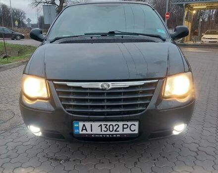 Черный Крайслер Вояджер, объемом двигателя 2.8 л и пробегом 225 тыс. км за 5000 $, фото 1 на Automoto.ua