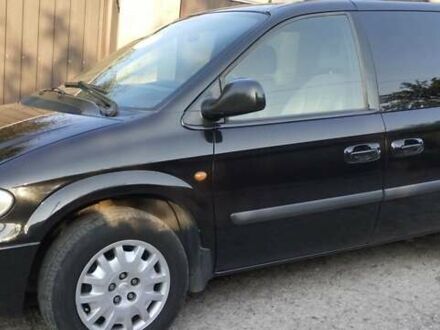 Черный Крайслер Вояджер, объемом двигателя 2.78 л и пробегом 195 тыс. км за 6500 $, фото 1 на Automoto.ua