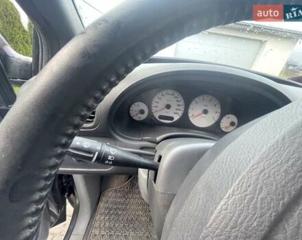 Серый Крайслер Вояджер, объемом двигателя 2.43 л и пробегом 313 тыс. км за 6500 $, фото 36 на Automoto.ua