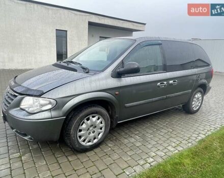 Серый Крайслер Вояджер, объемом двигателя 2.43 л и пробегом 313 тыс. км за 6500 $, фото 50 на Automoto.ua