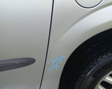 Сірий Крайслер Voyager, об'ємом двигуна 2.5 л та пробігом 312 тис. км за 4800 $, фото 19 на Automoto.ua