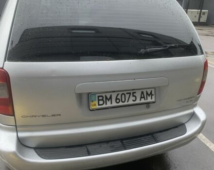 Серый Крайслер Вояджер, объемом двигателя 2.4 л и пробегом 176 тыс. км за 5600 $, фото 2 на Automoto.ua