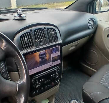 Крайслер Вояджер 2003 в Николаеве на Automoto.ua Серый Крайслер Вояджер, объемом двигателя 2.5 л и пробегом 380 тыс. км за 5200 $, фото 8 на Automoto.ua