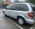Серый Крайслер Вояджер, объемом двигателя 2.4 л и пробегом 176 тыс. км за 5600 $, фото 3 на Automoto.ua
