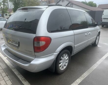 Серый Крайслер Вояджер, объемом двигателя 2.4 л и пробегом 176 тыс. км за 5600 $, фото 1 на Automoto.ua