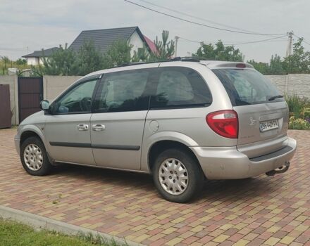 Серый Крайслер Вояджер, объемом двигателя 2.8 л и пробегом 347 тыс. км за 4003 $, фото 2 на Automoto.ua