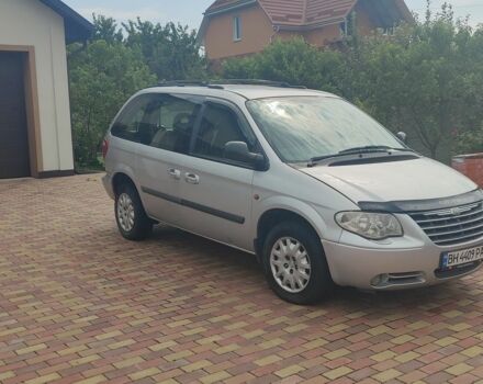 Серый Крайслер Вояджер, объемом двигателя 2.8 л и пробегом 347 тыс. км за 4003 $, фото 1 на Automoto.ua