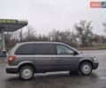 Сірий Крайслер Voyager, об'ємом двигуна 2.4 л та пробігом 311 тис. км за 7500 $, фото 3 на Automoto.ua