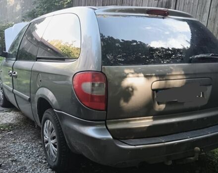 Серый Крайслер Вояджер, объемом двигателя 3.3 л и пробегом 300 тыс. км за 1786 $, фото 1 на Automoto.ua