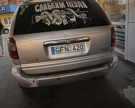 Серый Крайслер Вояджер, объемом двигателя 2.5 л и пробегом 270 тыс. км за 750 $, фото 1 на Automoto.ua