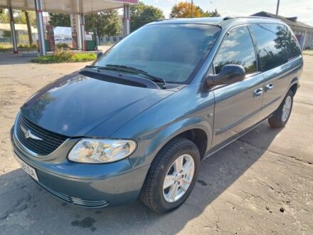 Сірий Крайслер Voyager, об'ємом двигуна 2.4 л та пробігом 400 тис. км за 5004 $, фото 1 на Automoto.ua