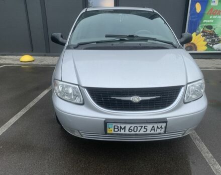 Серый Крайслер Вояджер, объемом двигателя 2.4 л и пробегом 176 тыс. км за 5600 $, фото 1 на Automoto.ua