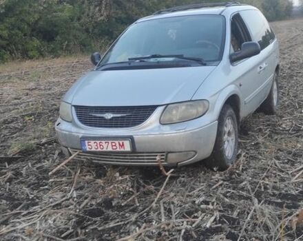 Серый Крайслер Вояджер, объемом двигателя 2.5 л и пробегом 300 тыс. км за 1815 $, фото 1 на Automoto.ua