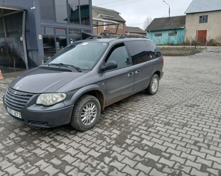 Серый Крайслер Вояджер, объемом двигателя 0 л и пробегом 234 тыс. км за 1565 $, фото 1 на Automoto.ua