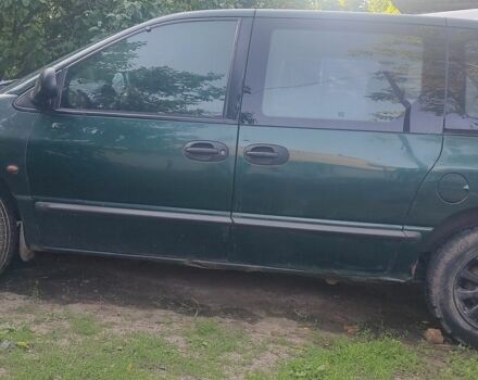 Зеленый Крайслер Вояджер, объемом двигателя 2.4 л и пробегом 445 тыс. км за 1310 $, фото 1 на Automoto.ua