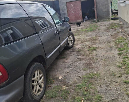 Зеленый Крайслер Вояджер, объемом двигателя 2.5 л и пробегом 432 тыс. км за 3500 $, фото 2 на Automoto.ua