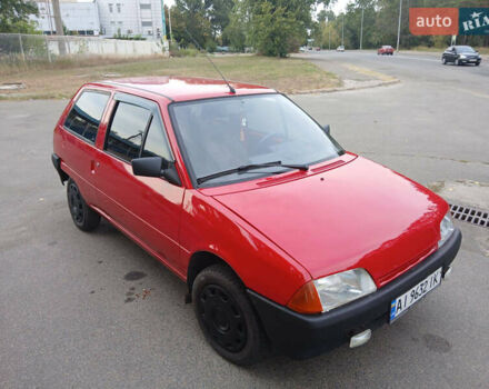 Красный Ситроен АХ, объемом двигателя 1.1 л и пробегом 240 тыс. км за 900 $, фото 1 на Automoto.ua