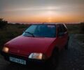 Красный Ситроен АХ, объемом двигателя 1.4 л и пробегом 300 тыс. км за 500 $, фото 1 на Automoto.ua