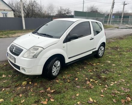 Белый Ситроен С2, объемом двигателя 1.4 л и пробегом 350 тыс. км за 2450 $, фото 1 на Automoto.ua