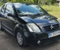 Черный Ситроен С2, объемом двигателя 1.4 л и пробегом 254 тыс. км за 5000 $, фото 1 на Automoto.ua