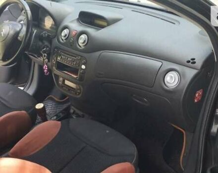 Черный Ситроен С2, объемом двигателя 1.4 л и пробегом 254 тыс. км за 5000 $, фото 11 на Automoto.ua