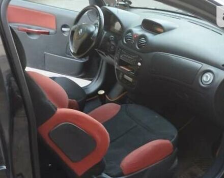 Черный Ситроен С2, объемом двигателя 1.4 л и пробегом 254 тыс. км за 5000 $, фото 30 на Automoto.ua