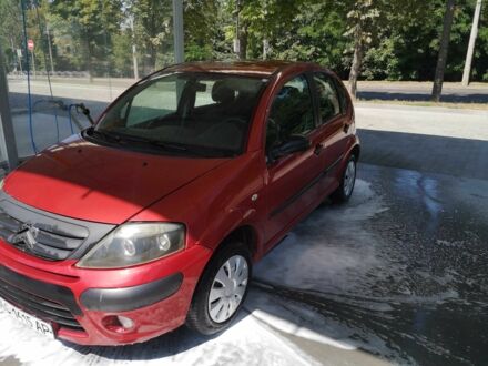 Красный Ситроен С3, объемом двигателя 1.4 л и пробегом 321 тыс. км за 3500 $, фото 1 на Automoto.ua
