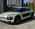 Сітроен C4 Кактус 2014 у Каменце-Подольском на Automoto.ua Білий Сітроен C4 Кактус, об'ємом двигуна 1.56 л та пробігом 215 тис. км за 9300 $, фото 1 на Automoto.ua