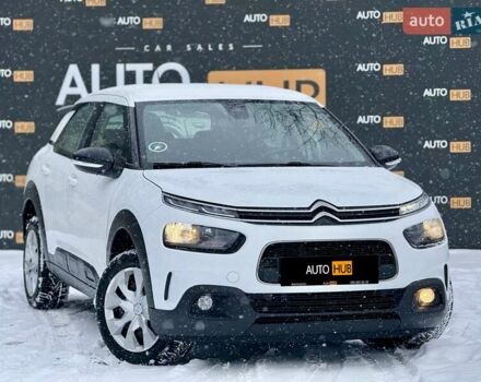 Белый Ситроен C4 Кактус, объемом двигателя 1.56 л и пробегом 193 тыс. км за 11800 $, фото 1 на Automoto.ua