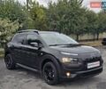 Чорний Сітроен C4 Кактус, об'ємом двигуна 1.2 л та пробігом 170 тис. км за 9499 $, фото 4 на Automoto.ua