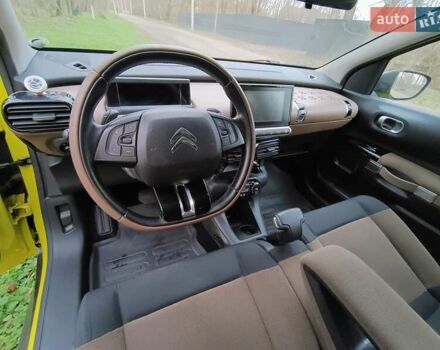 Желтый Ситроен C4 Кактус, объемом двигателя 1.56 л и пробегом 106 тыс. км за 11800 $, фото 16 на Automoto.ua