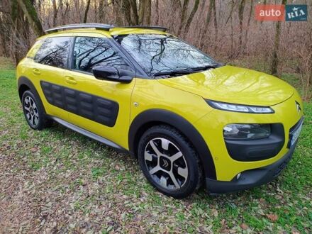 Желтый Ситроен C4 Кактус, объемом двигателя 1.56 л и пробегом 106 тыс. км за 11800 $, фото 1 на Automoto.ua