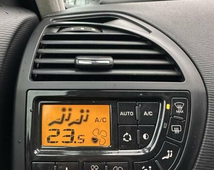 Фиолетовый Ситроен С4 Пикассо, объемом двигателя 2 л и пробегом 205 тыс. км за 7600 $, фото 31 на Automoto.ua