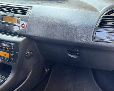 Белый Ситроен С4, объемом двигателя 1.59 л и пробегом 230 тыс. км за 4300 $, фото 13 на Automoto.ua